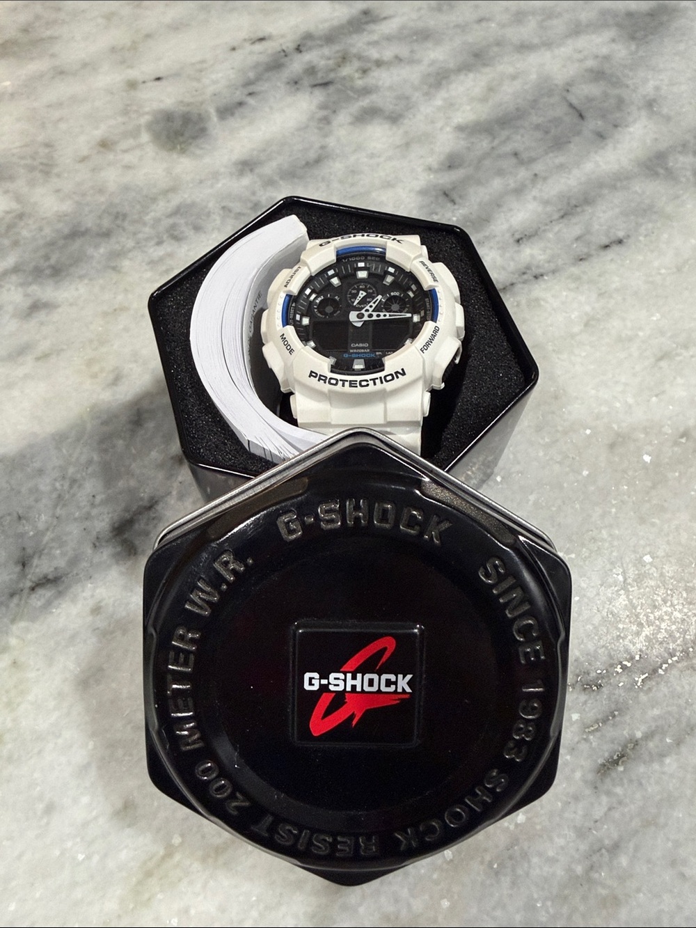 G-Shock White Resin Watch with Black Dial and Blue Accents
